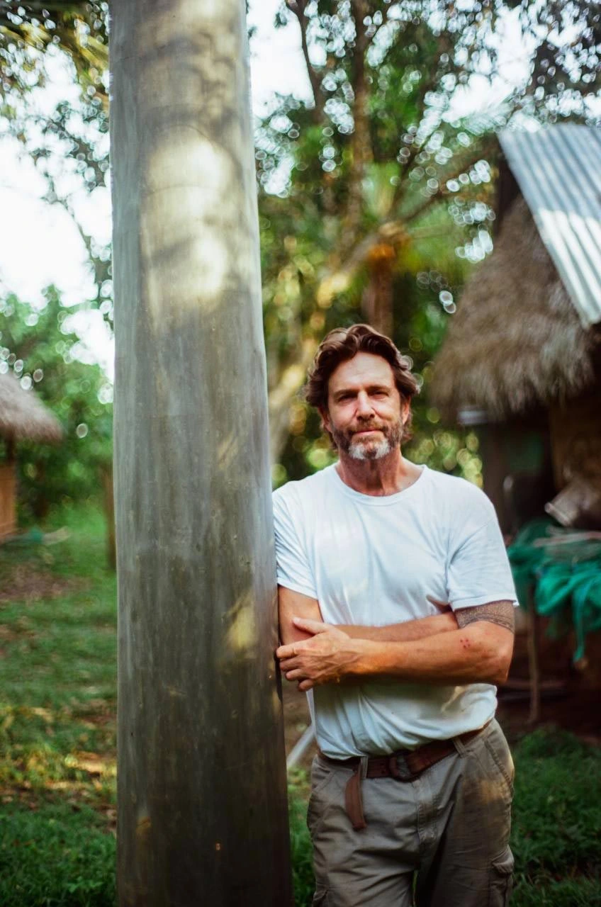 John Patton beside a Capirona tree